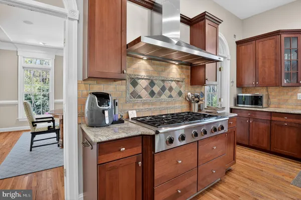 $2,499,000 | 5807 Grosvenor Lane, Bethesda, MD 20814