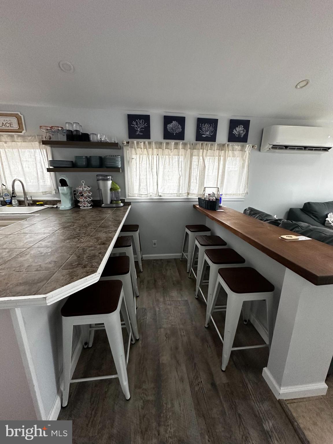 24 Angler Road Tuckerton, NJ 08087 - Photo 12 of 27 a kitchen with a sink a stove a window and white cabinets