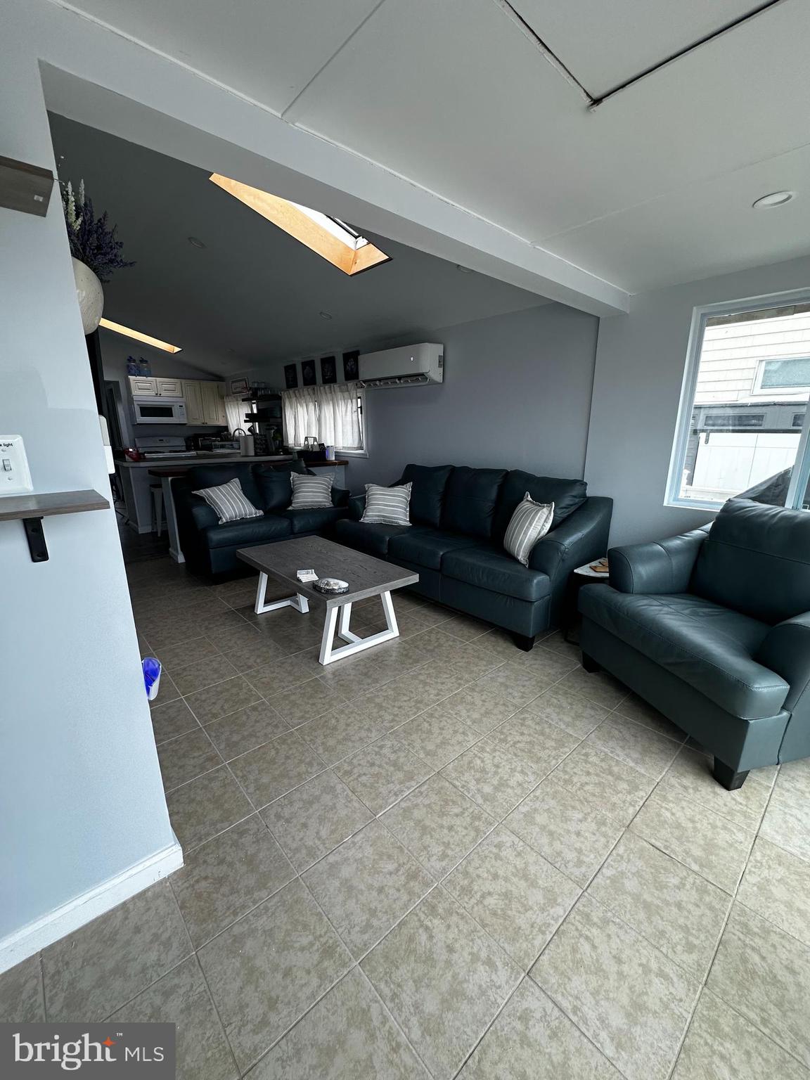 24 Angler Road Tuckerton, NJ 08087 - Photo 17 of 27 a living room with furniture and a window