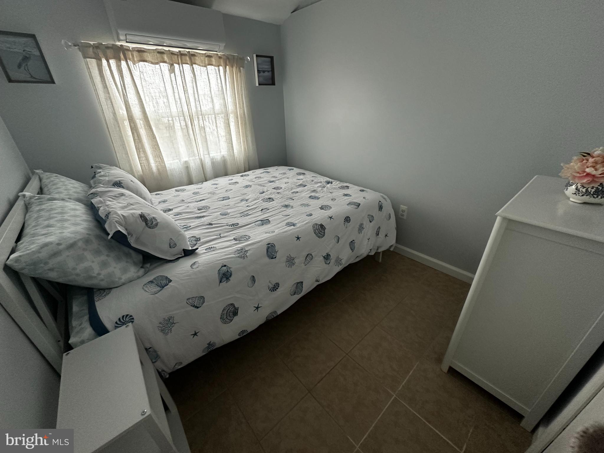 24 Angler Road Tuckerton, NJ 08087 - Photo 22 of 27 a bedroom with a bed and a window