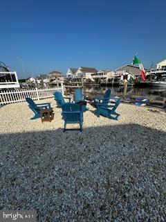 24 Angler Road Tuckerton, NJ 08087 - Photo 6 of 27 a view of a yard with table and chairs