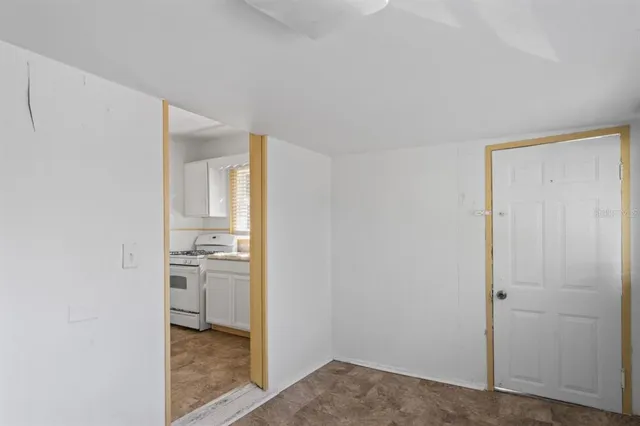 a view of a bathroom with a sink and a mirror