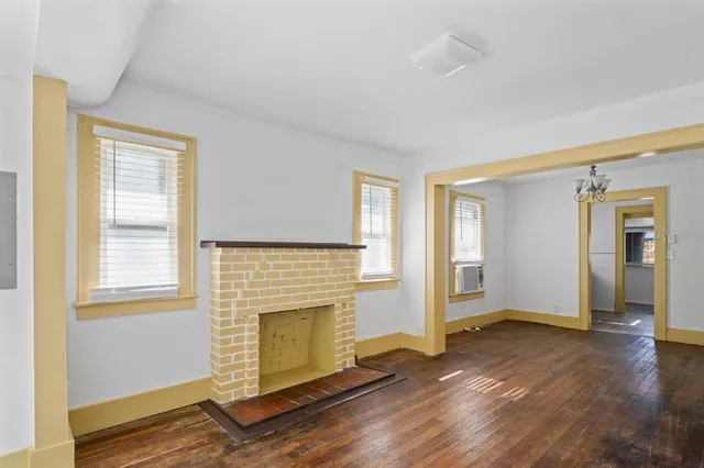 a view of a room with a large window