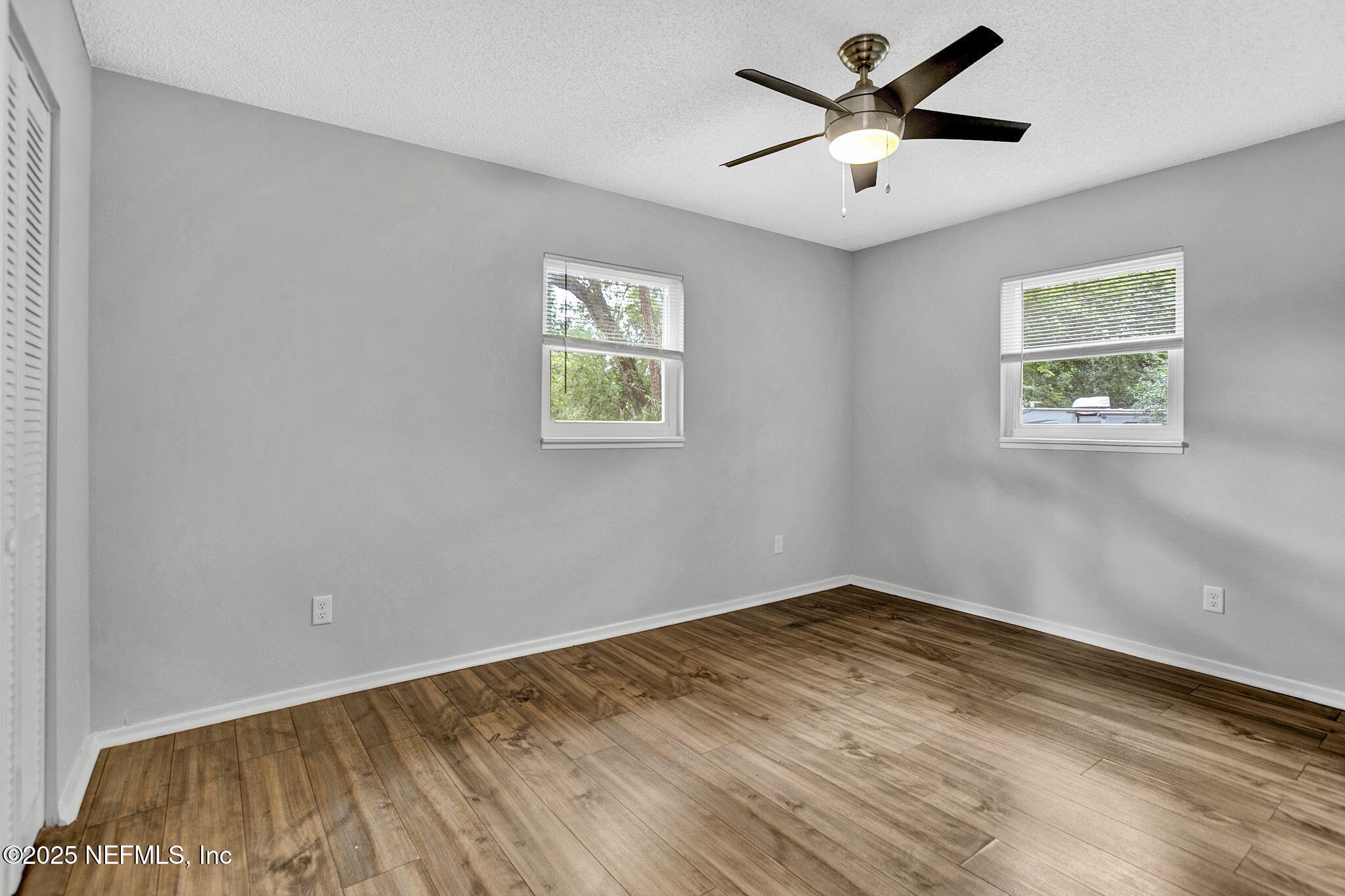 3645 Edison Avenue Jacksonville, FL 32254 - Photo 19 of 19 a view of a room with a window and a ceiling fan