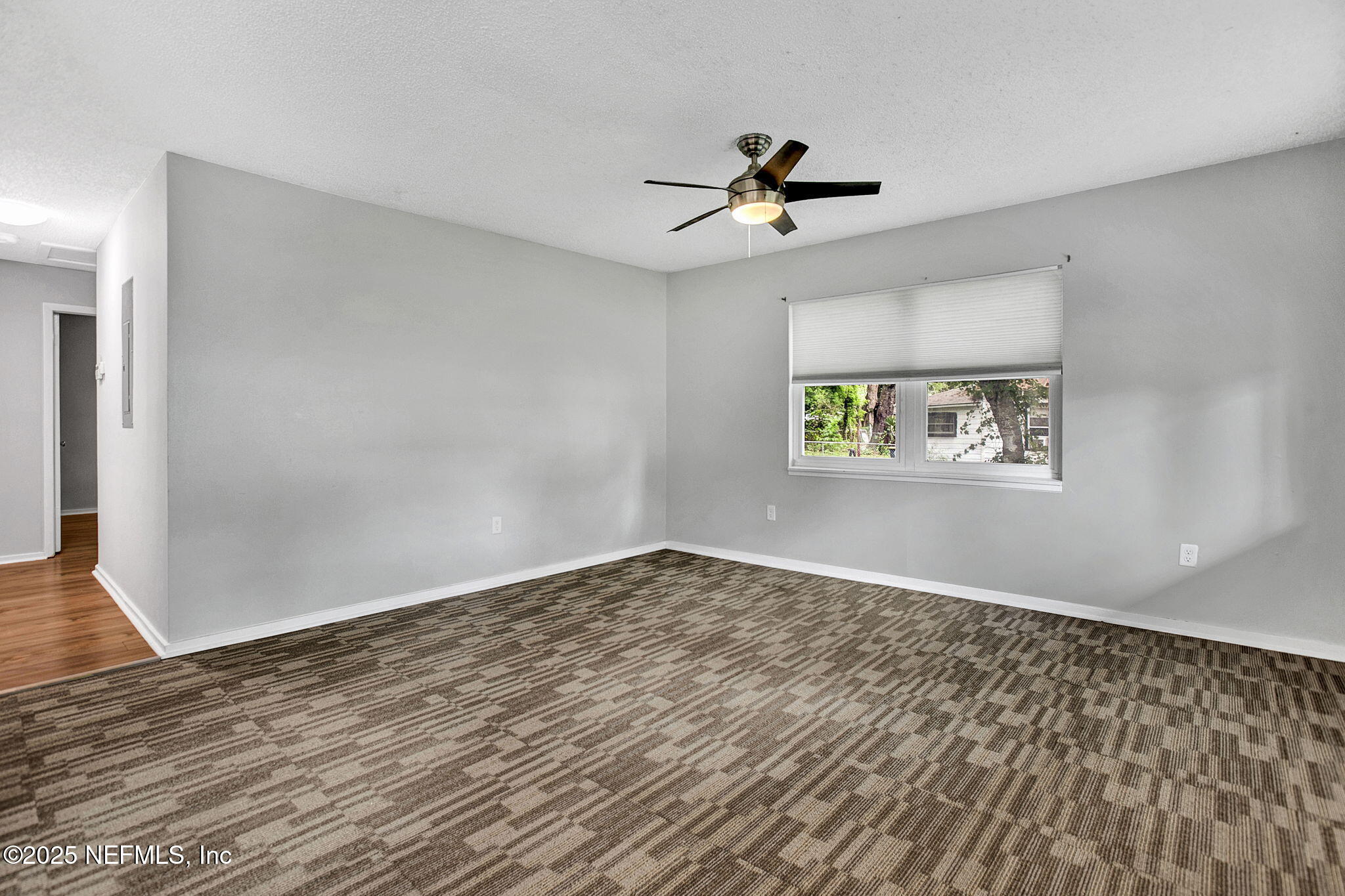 3645 Edison Avenue Jacksonville, FL 32254 - Photo 7 of 19 a view of empty room with wooden floor