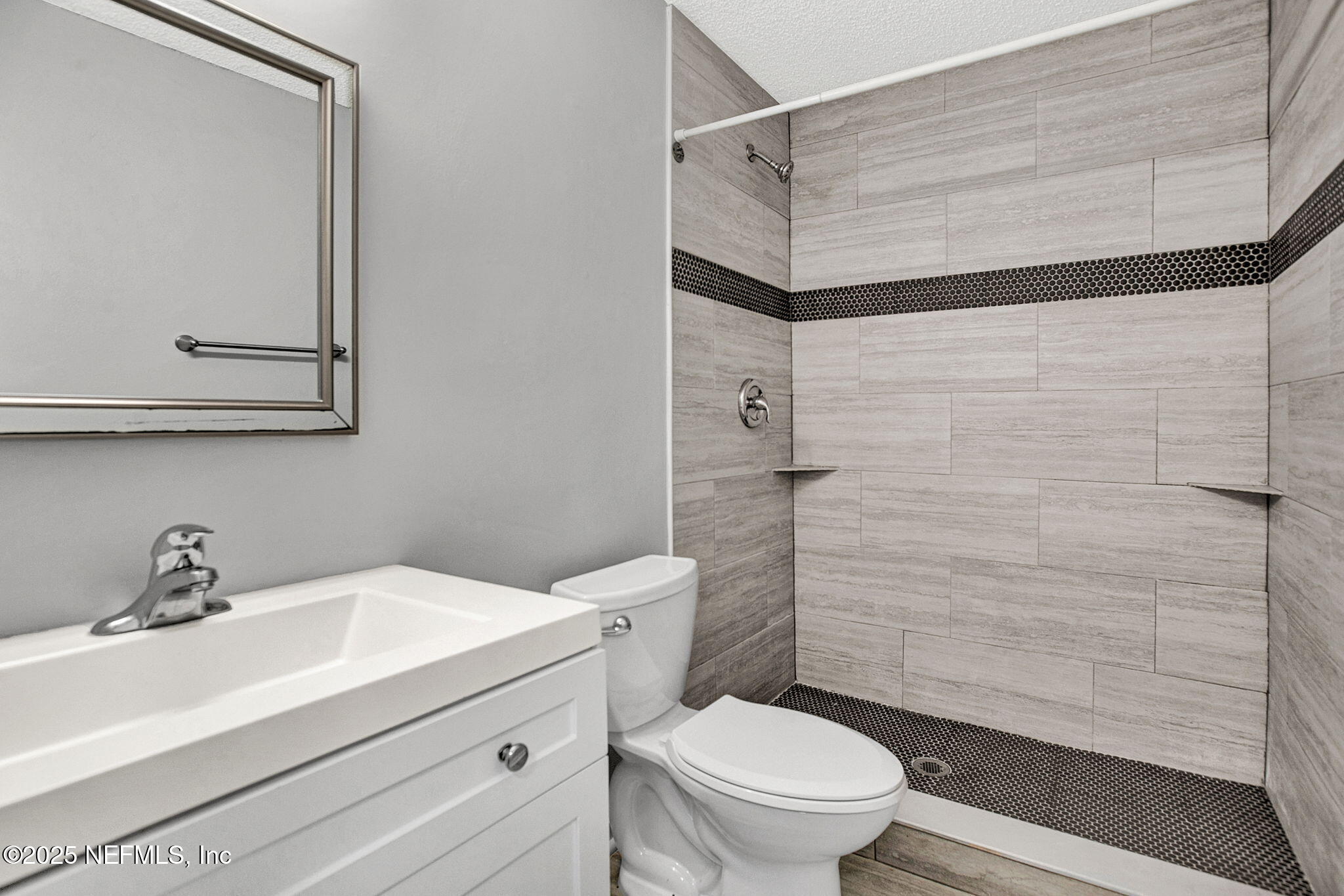 3645 Edison Avenue Jacksonville, FL 32254 - Photo 9 of 19 a bathroom with a sink toilet and shower