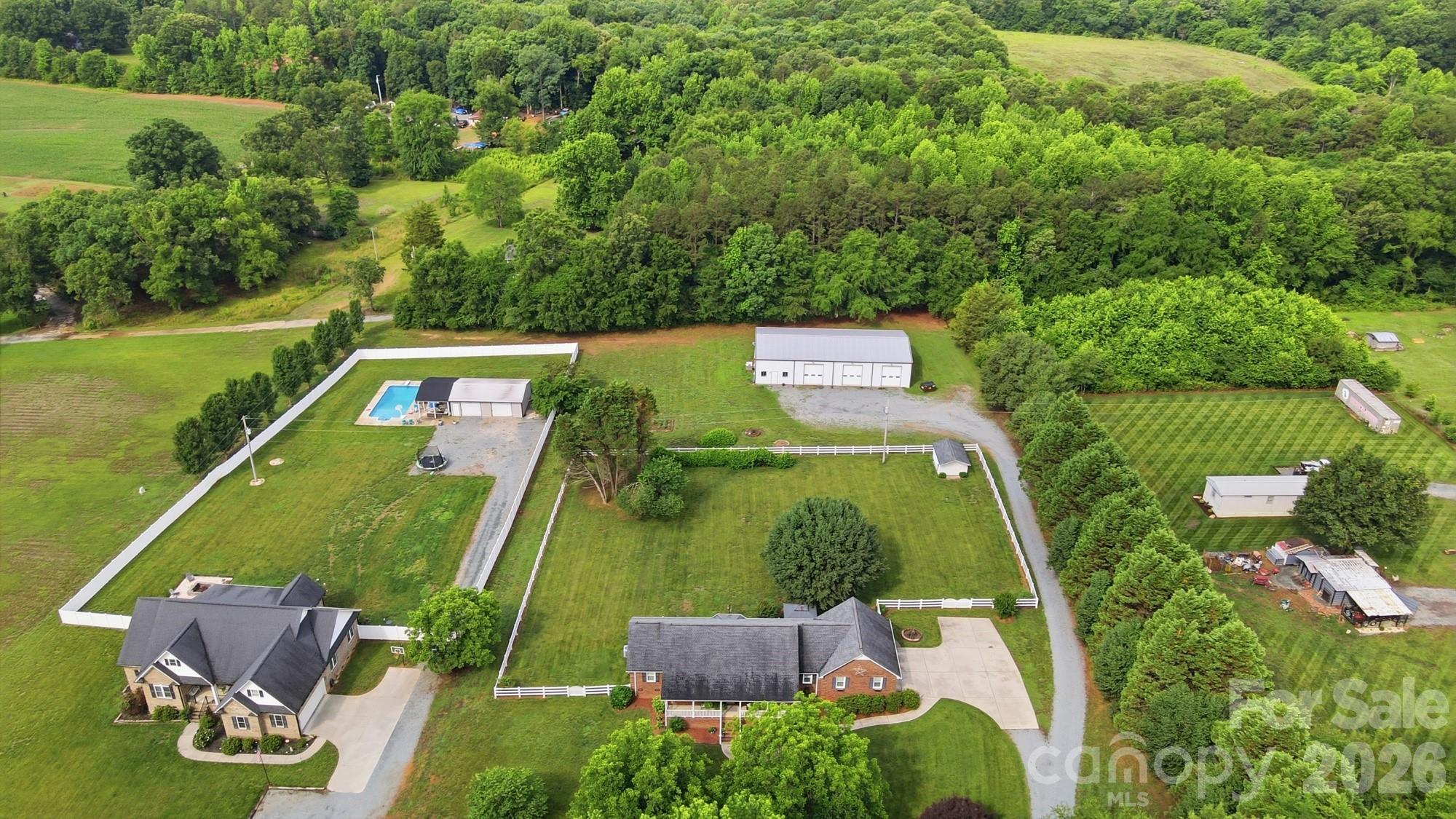 4017 Mullis Newsome Road Monroe, NC 28110 - Photo 3 of 38 an aerial view of a house with a yard