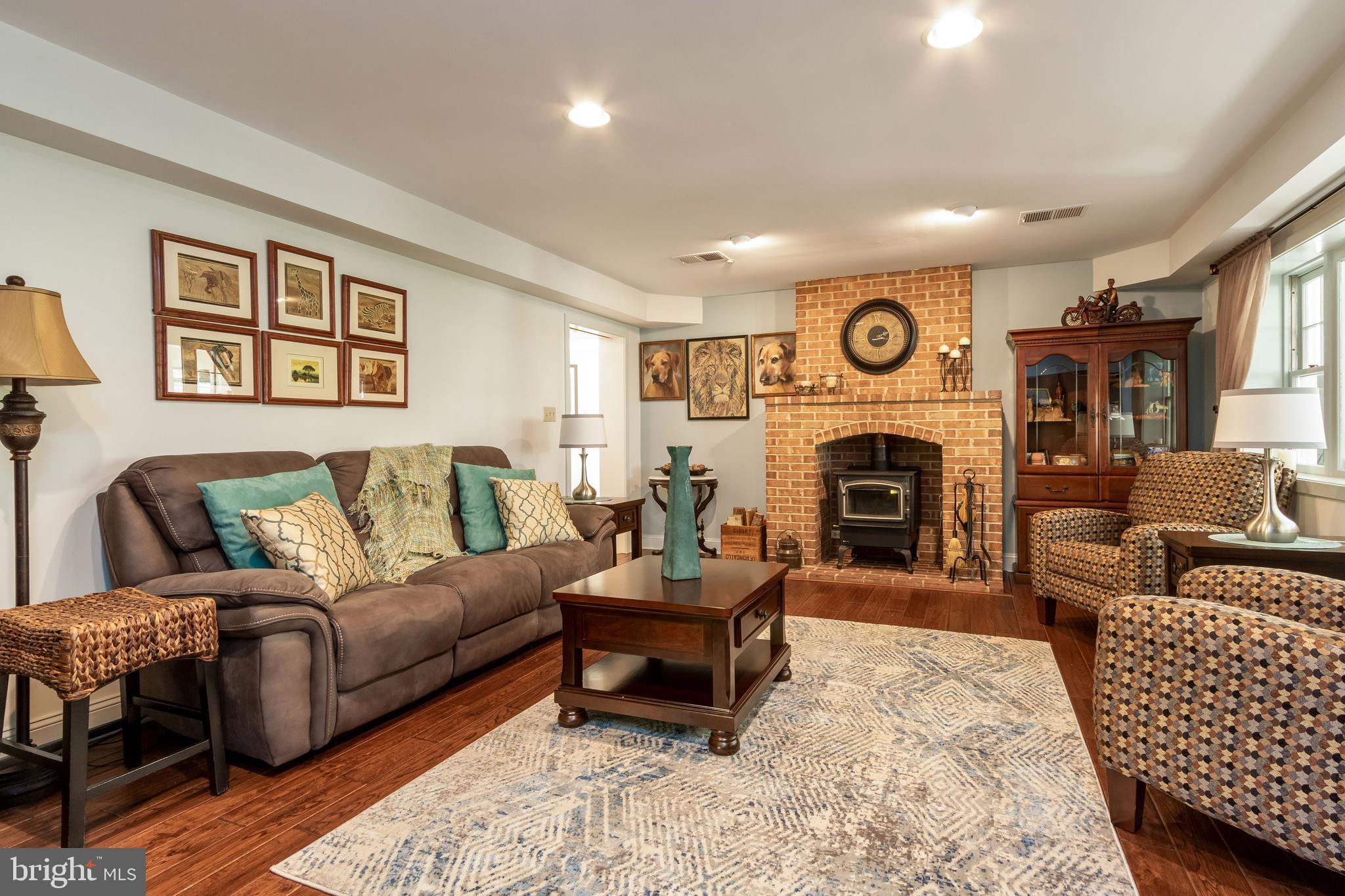 1710 West Rock Road Perkasie, PA 18944 - Photo 23 of 56 Brick fireplace with woodstove
