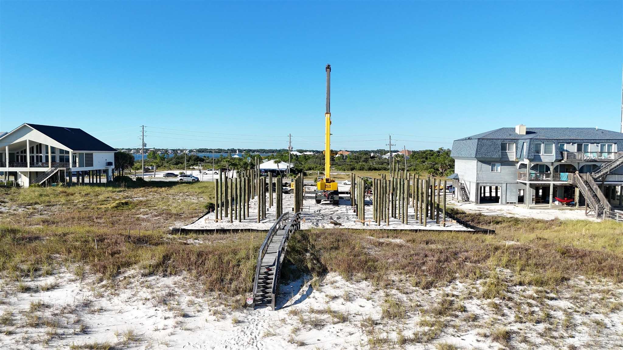 14719 Perdido Key Drive Perdido Key, FL 32507 - Photo 10 of 21 a view of a lake with boats and palm trees
