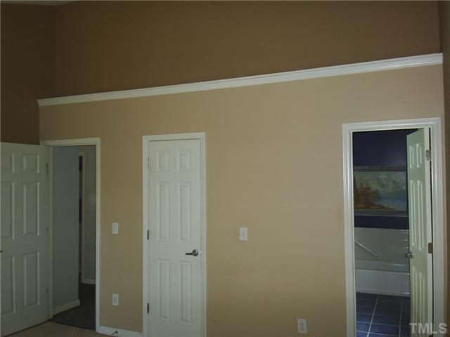 6909 Whittlesea Place Raleigh, NC 27616 - Photo 9 of 16 With the cathedral ceiling carried over into the master bedroom you get.... you geussed it more space!! Place your trophies or add a nice decorator's touch to the shelf space above the walk-in-closet and bath!