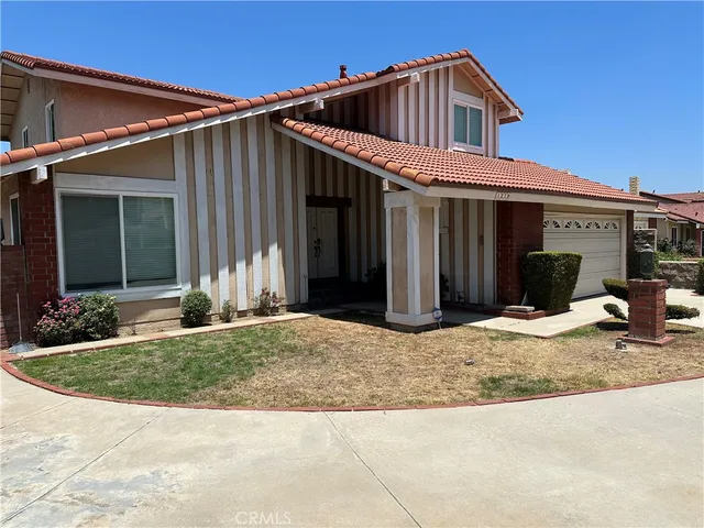a front view of a house having yard