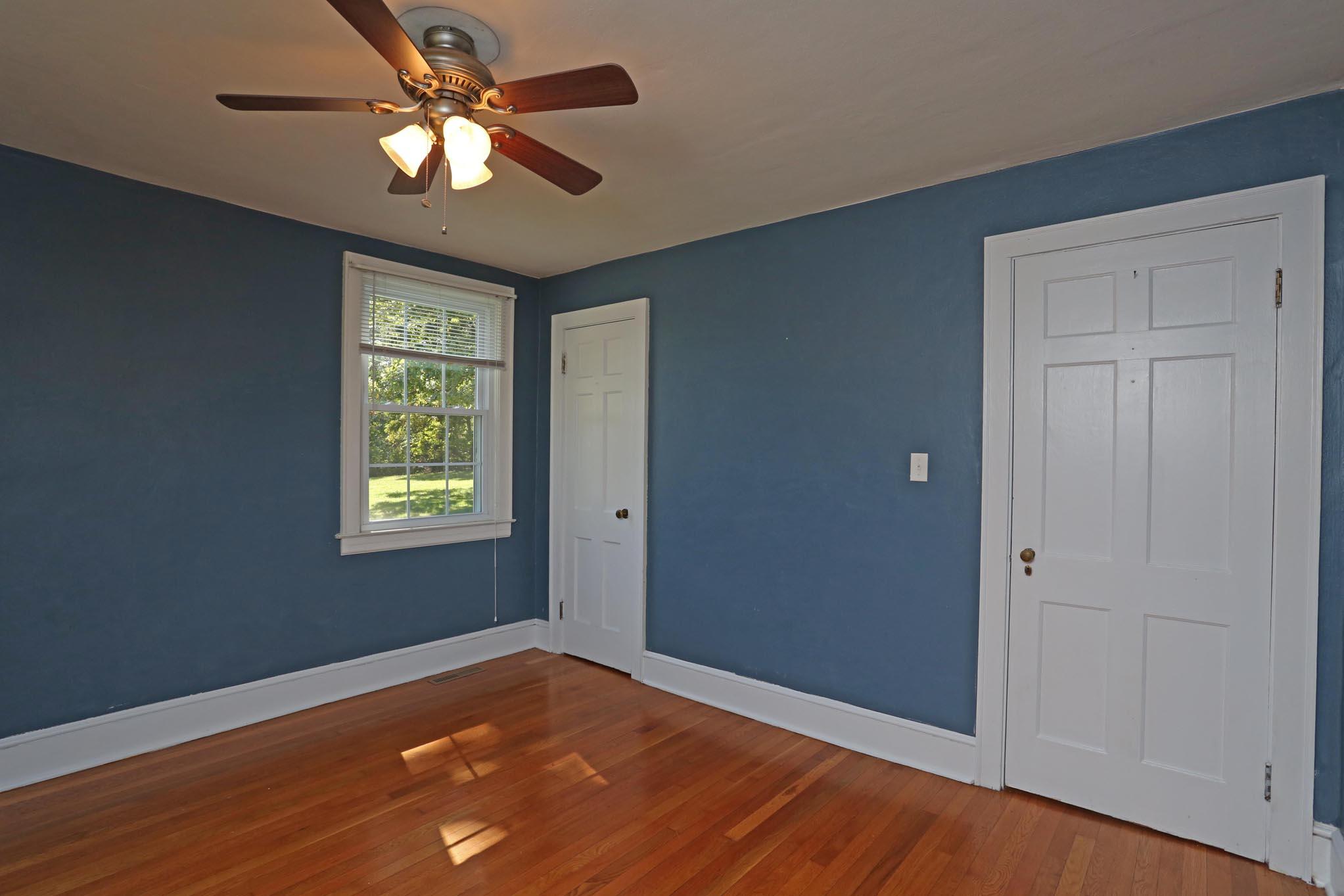 3124 Blue Ridge Boulevard Roanoke, VA 24012 - Photo 14 of 49 an empty room with a window and a ceiling fan