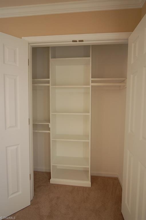 2014 Neelley Road Pleasant Garden, NC 27313 - Photo 21 of 30 All closets have organizers. Master closet is a walk in closet