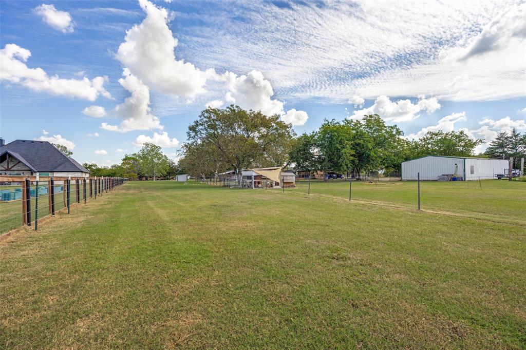 9591 Dripping Spring Road Denison, TX 75021 - Photo 20 of 23 a view of an outdoor space and swimming pool