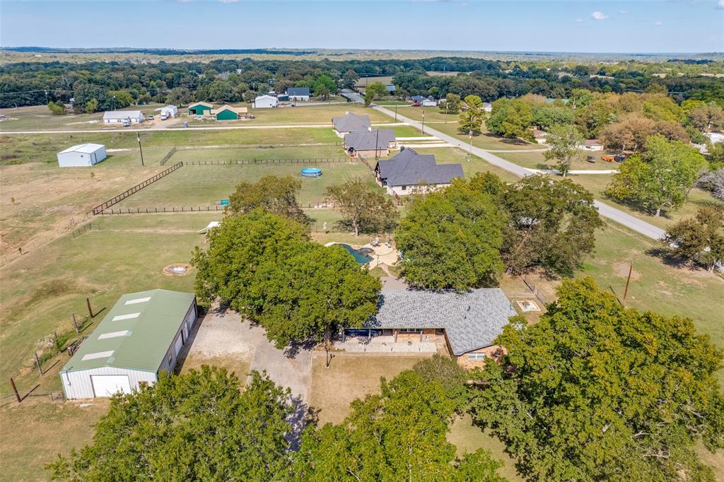 9591 Dripping Spring Road Denison, TX 75021 - Photo 23 of 23 an aerial view of residential houses with outdoor space