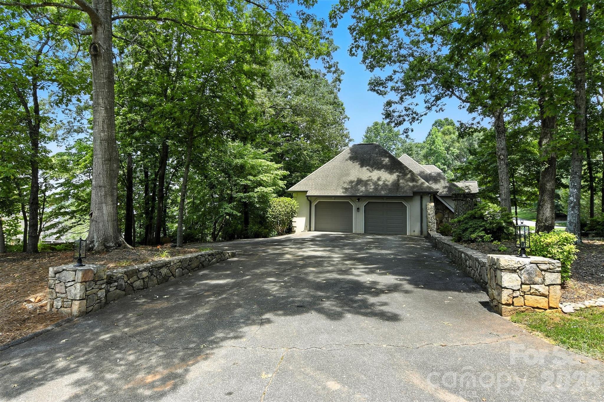 5042 Ridge Land Drive Hickory, NC 28602 - Photo 35 of 46 a front view of a house with garden
