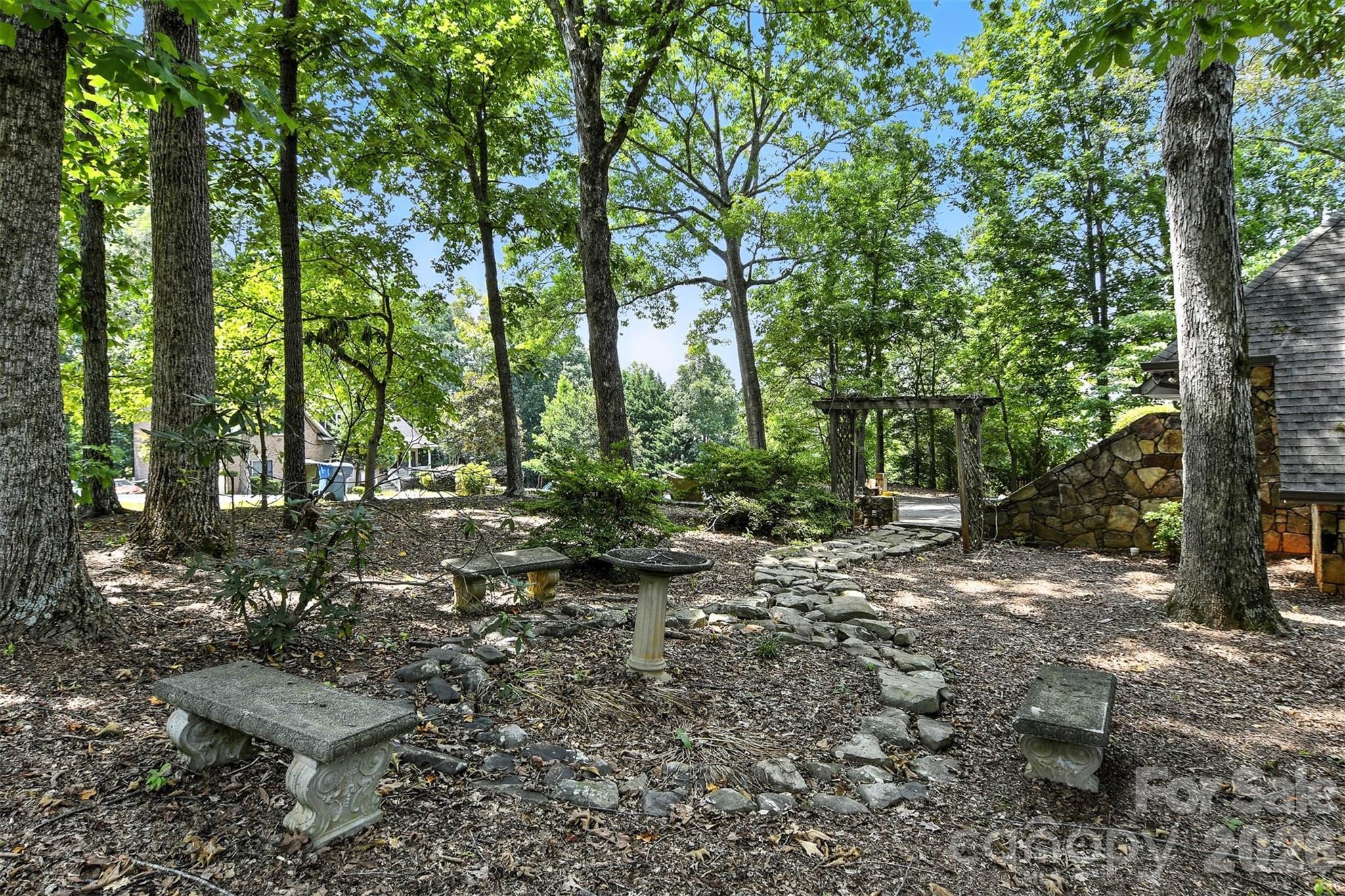 5042 Ridge Land Drive Hickory, NC 28602 - Photo 36 of 46 a view of a forest with trees in the background