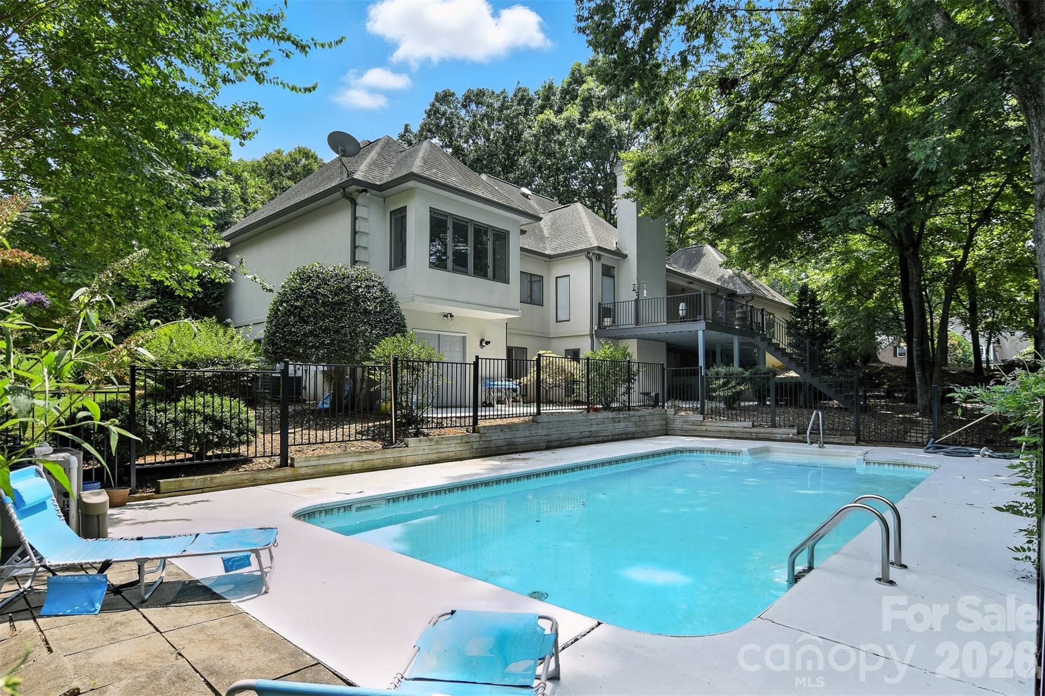 5042 Ridge Land Drive Hickory, NC 28602 - Photo 39 of 46 a view of a house with swimming pool and sitting area