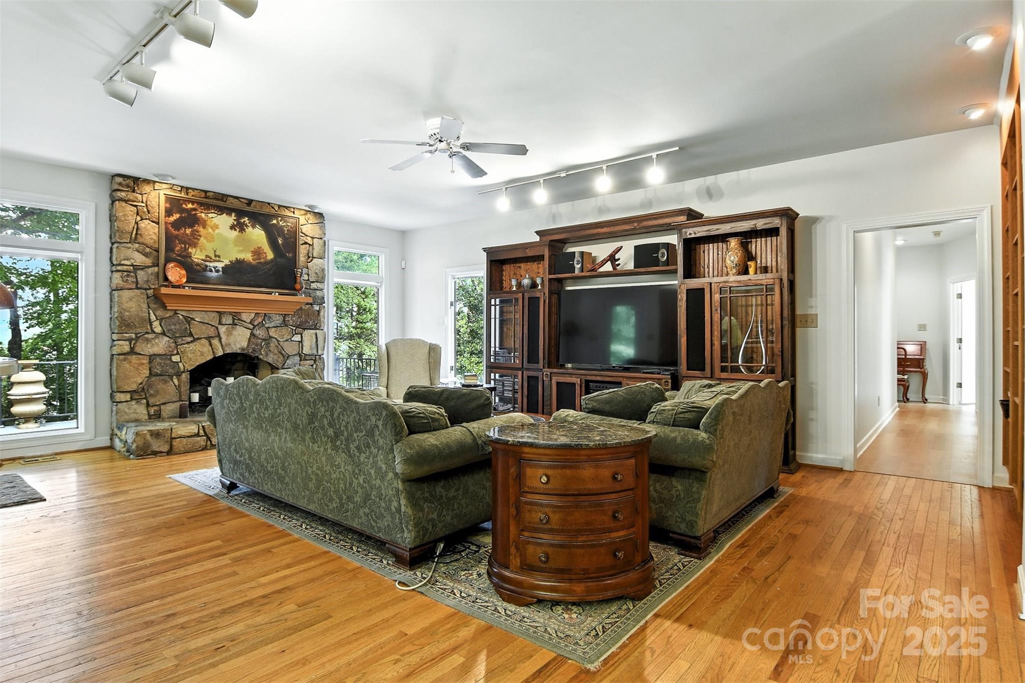 5042 Ridge Land Drive Hickory, NC 28602 - Photo 4 of 46 a living room with furniture and a flat screen tv