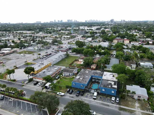 an aerial view of a city with lots of residential buildings