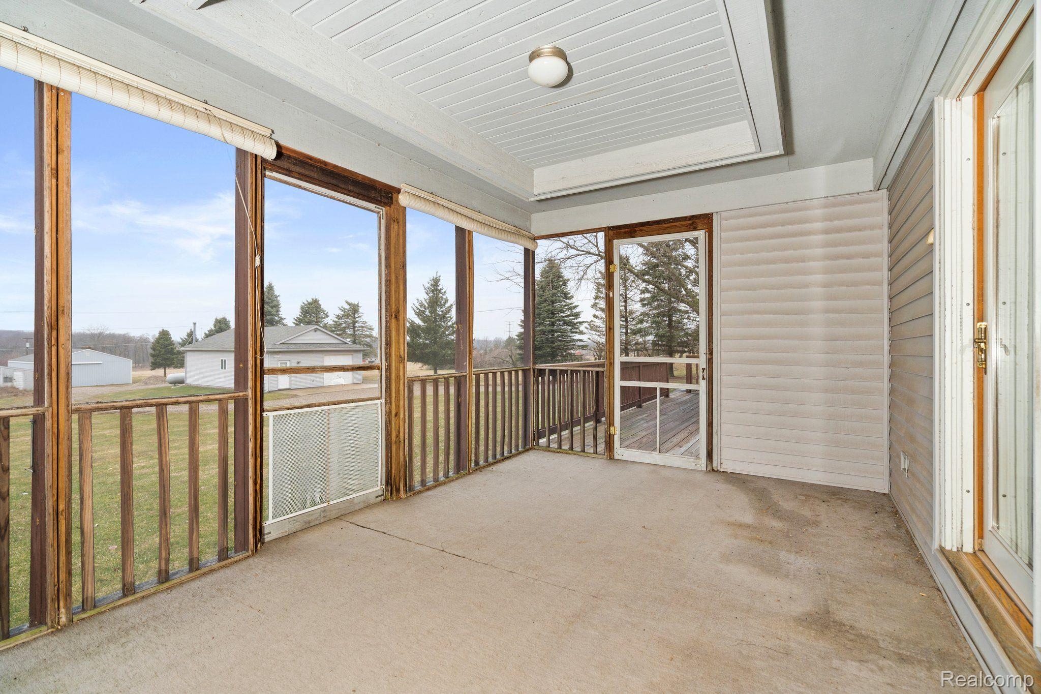 320 South Truhn Road Fowlerville, MI 48836 - Photo 26 of 35 Screened in porch