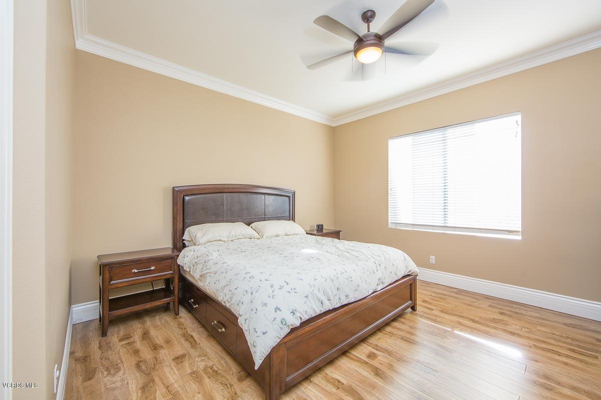 2467 Pathway Avenue Simi Valley, CA 93063 - Photo 22 of 29 a bedroom with a bed and window