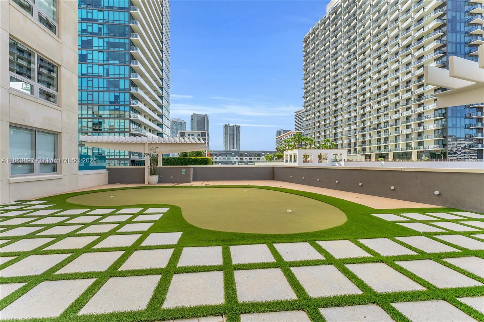 3250 Northeast 1st Avenue, Unit 1120 Miami, FL 33137 - Photo 34 of 39 a swimming pool with outdoor view