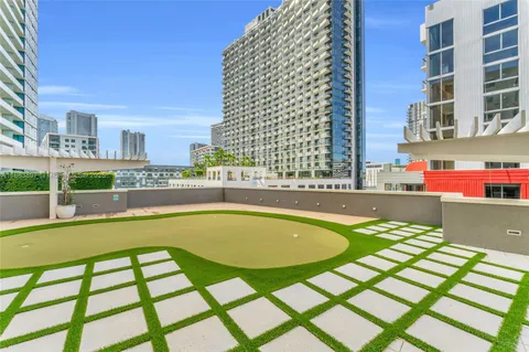 a view of swimming pool from a balcony