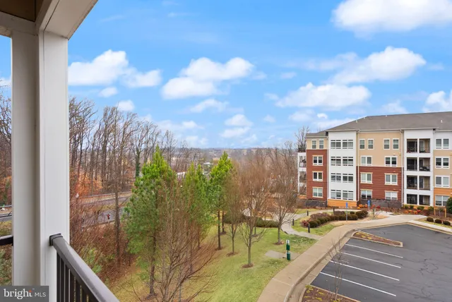 a view of a balcony with city view