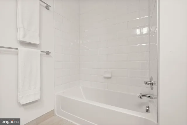 a close view of a bathtub in bathroom