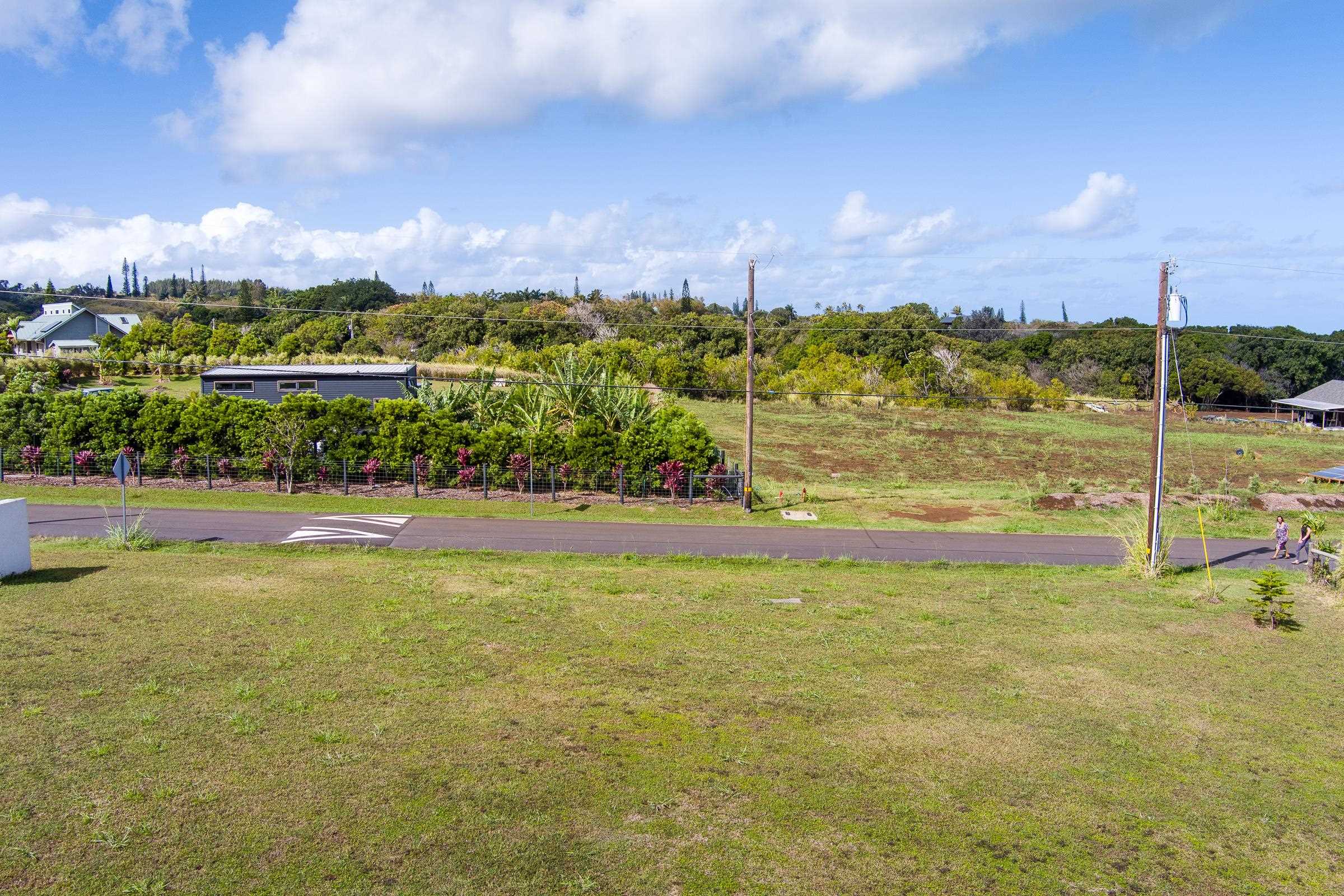674 Kauaheahe Place, Unit A Haiku, HI 96708 - Photo 17 of 21 a view of a lake with a big yard