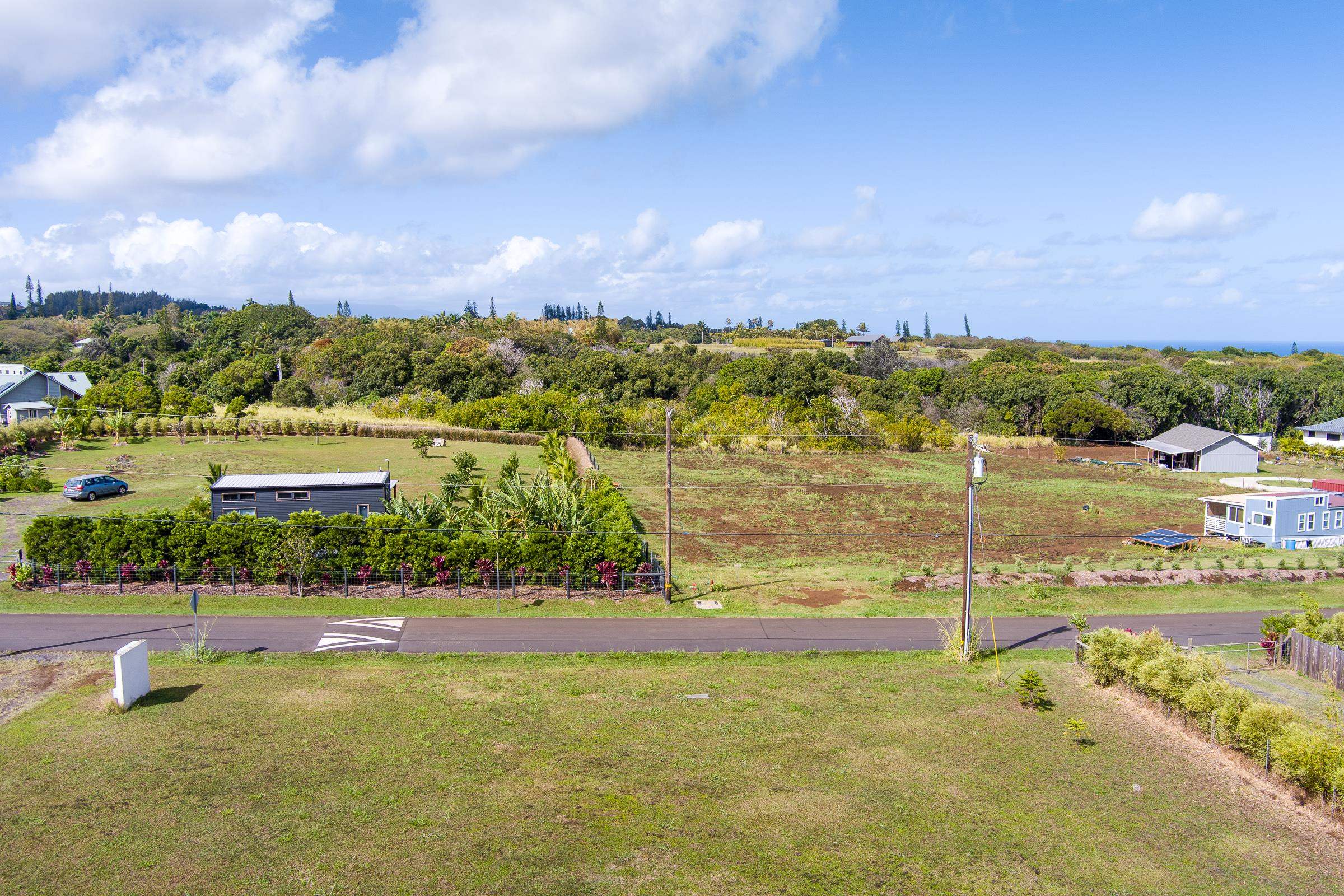 674 Kauaheahe Place, Unit A Haiku, HI 96708 - Photo 20 of 21 a view of a lake with a big yard