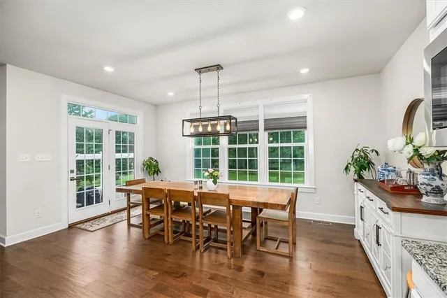 a kitchen with stainless steel appliances granite countertop lots of counter top space