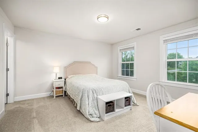 a bathroom with a double vanity sink mirror and double