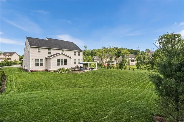 a view of a house with a big yard