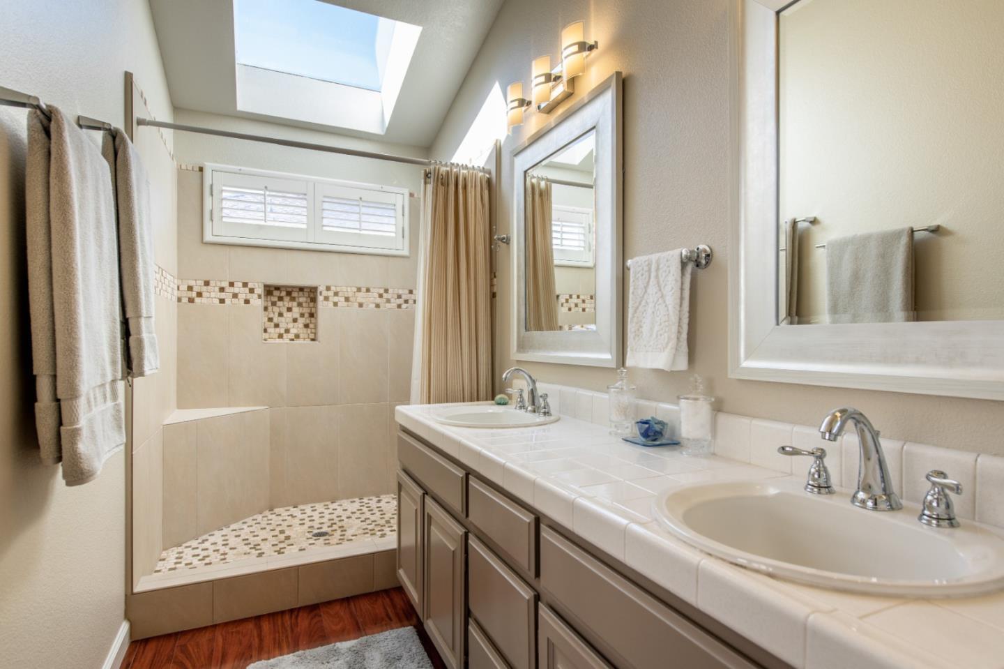 132 Patrick Way Half Moon Bay, CA 94019 - Photo 16 of 22 a bathroom with a sink and a mirror