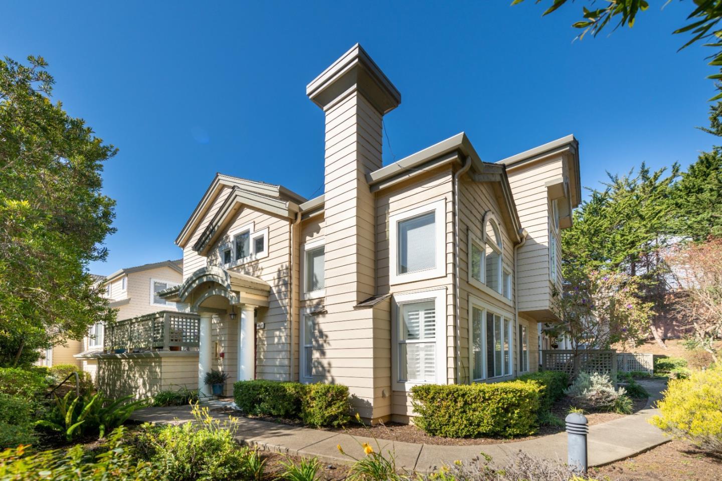 132 Patrick Way Half Moon Bay, CA 94019 - Photo 3 of 22 a front view of a house with a yard