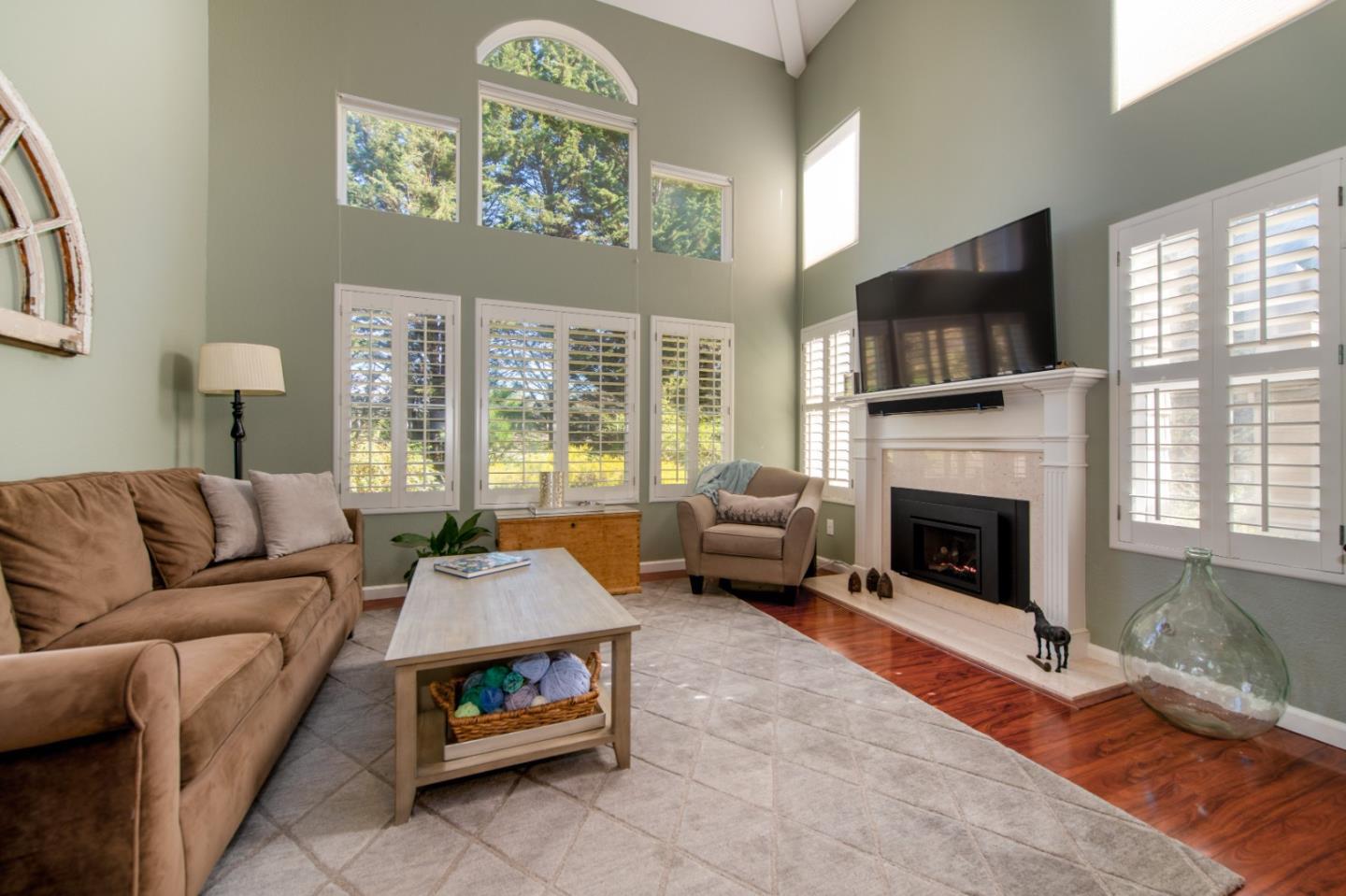 132 Patrick Way Half Moon Bay, CA 94019 - Photo 4 of 22 a living room with furniture fireplace and flat screen tv