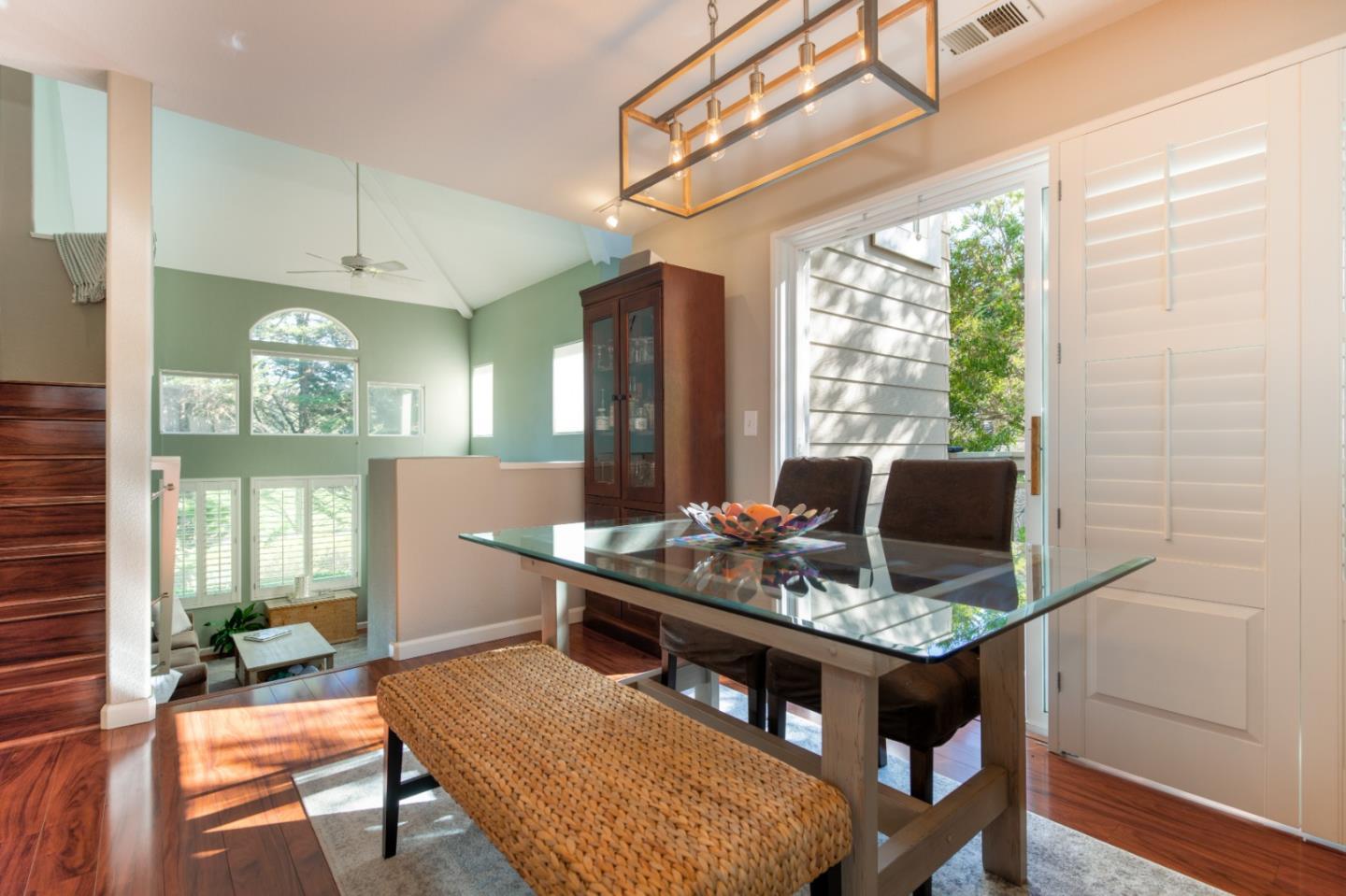 132 Patrick Way Half Moon Bay, CA 94019 - Photo 6 of 22 a living room with furniture and large windows