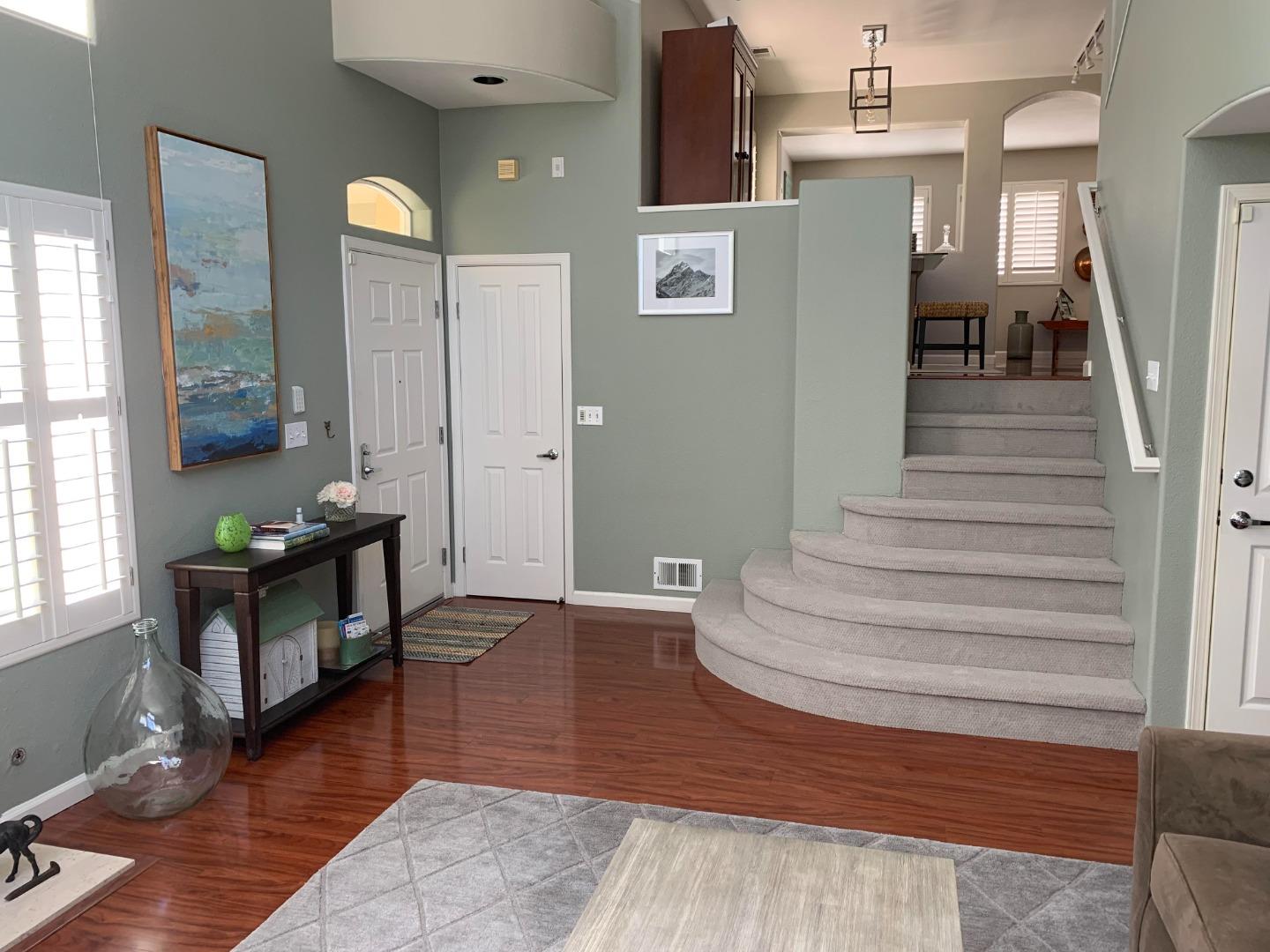 132 Patrick Way Half Moon Bay, CA 94019 - Photo 8 of 22 a living room with furniture and a wooden floor
