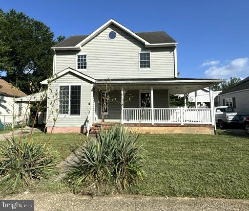 6 Parkwood Road Baltimore, MD 21222 - Photo 1 of 30 a front view of a house with a yard