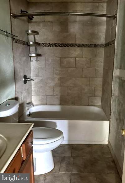 6 Parkwood Road Baltimore, MD 21222 - Photo 19 of 30 a bathroom with a shower and a toilet
