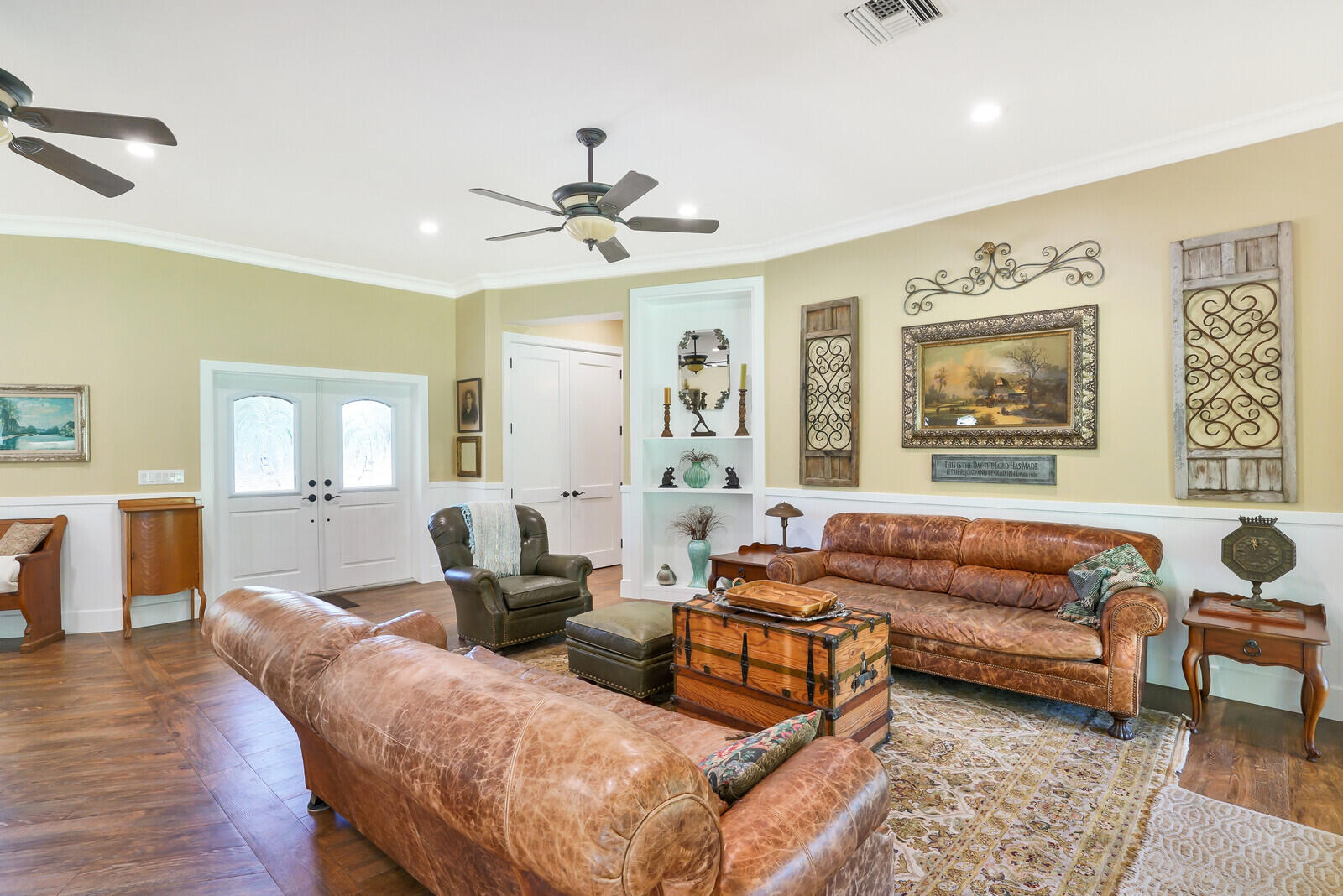 6624 Dillman Road Greenacres, FL 33413 - Photo 19 of 65 a living room with furniture ceiling fan and a wooden floor