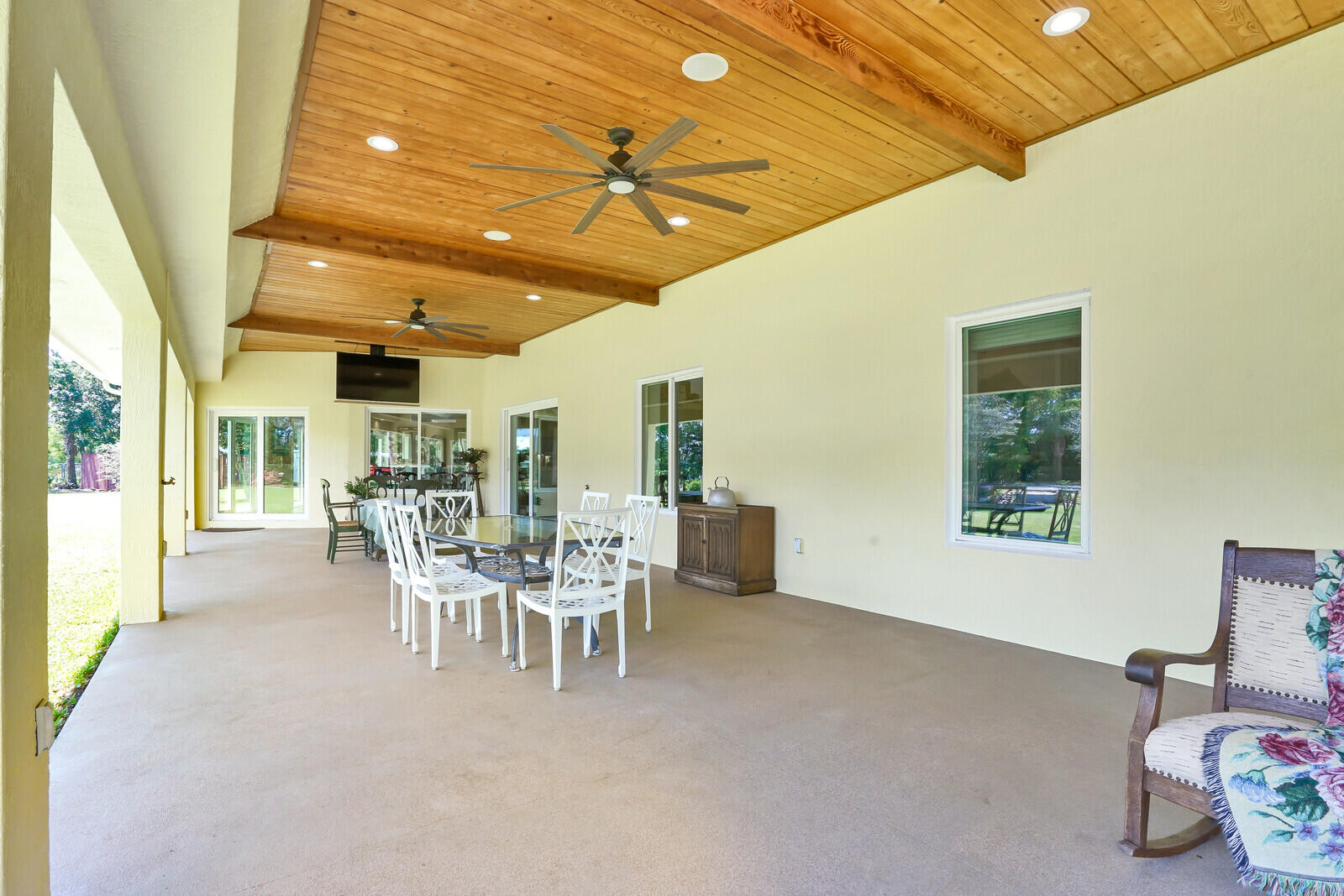 6624 Dillman Road Greenacres, FL 33413 - Photo 37 of 65 a dining room with furniture and a chandelier