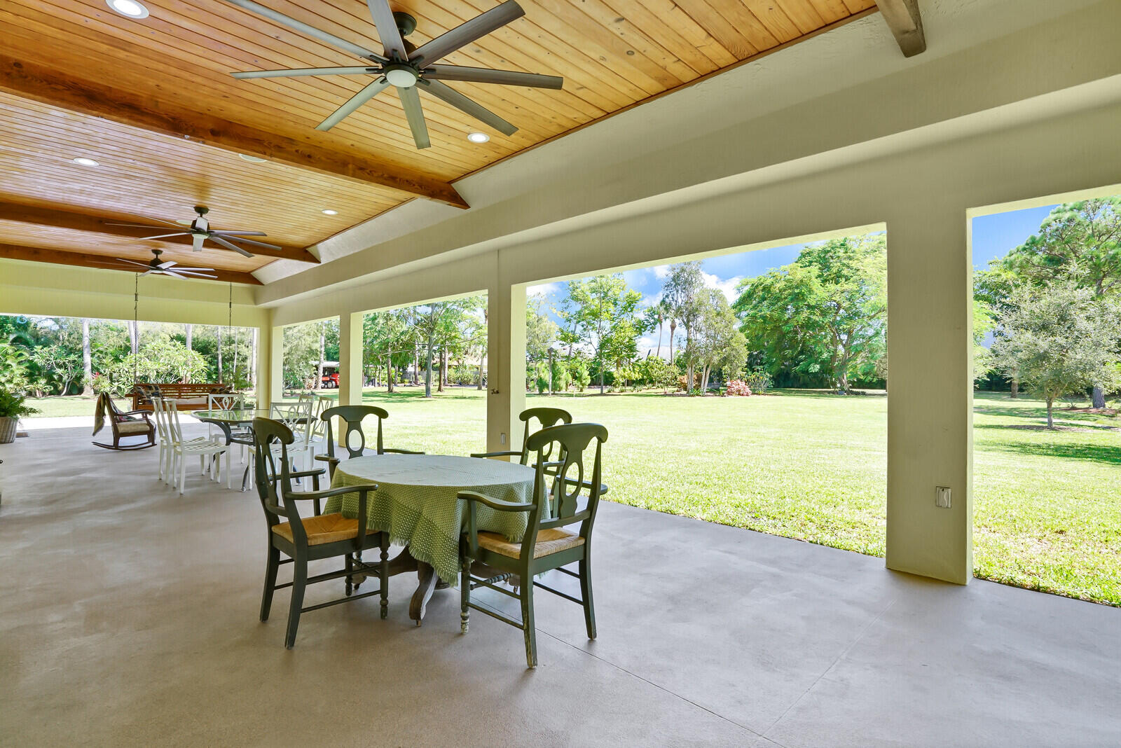 6624 Dillman Road Greenacres, FL 33413 - Photo 39 of 65 a view of a dining room with furniture window and outside view