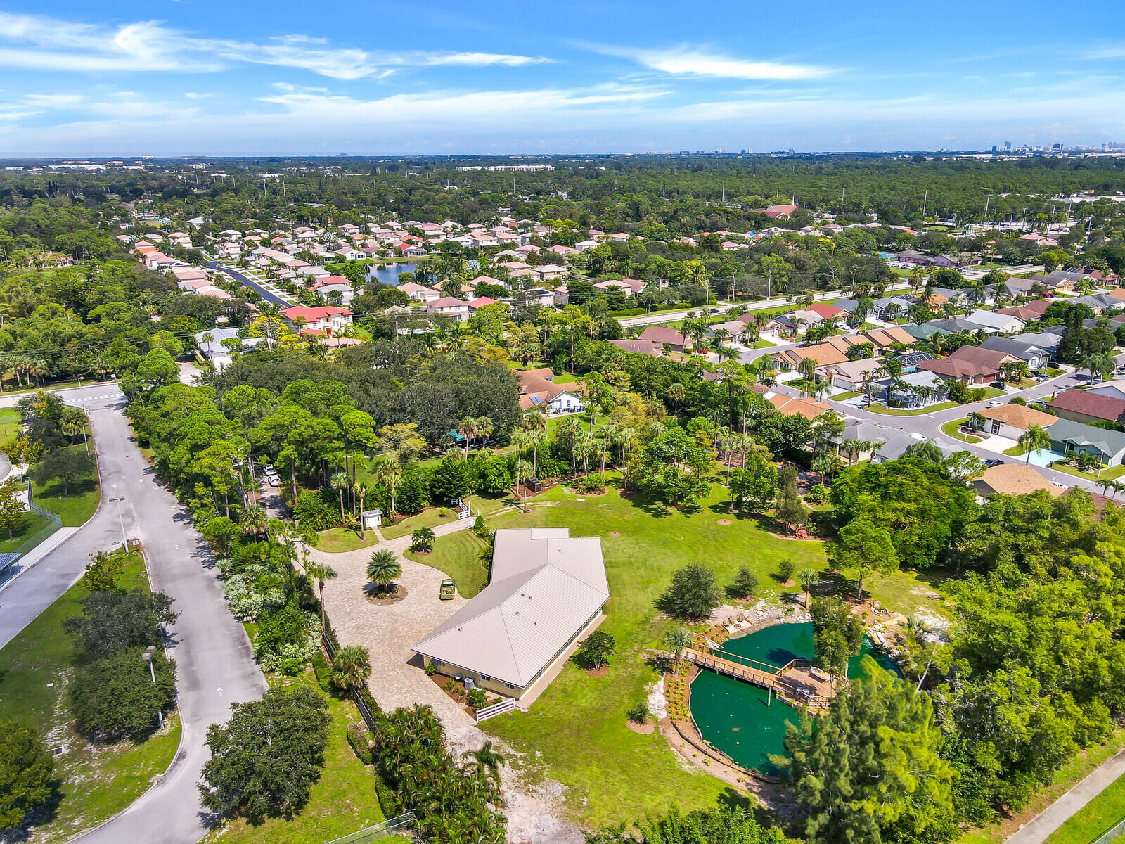6624 Dillman Road Greenacres, FL 33413 - Photo 50 of 65 an aerial view of residential houses with outdoor space