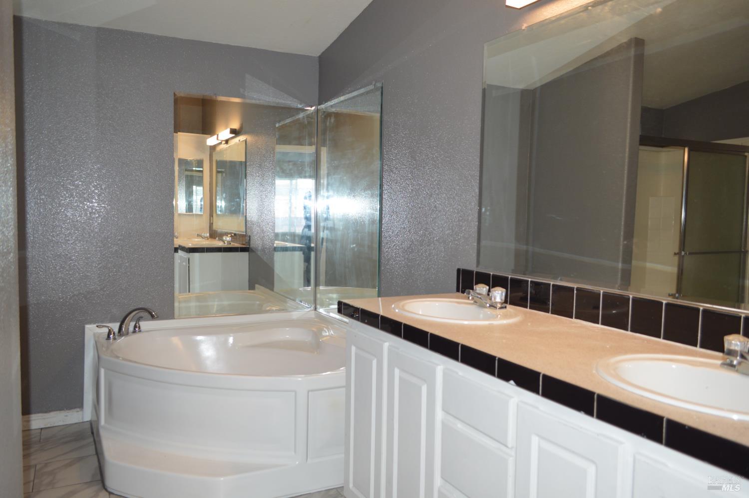 3900 North State Street, Unit 75 Ukiah, CA 95482 - Photo 12 of 22 a bathroom with a sink and a mirror