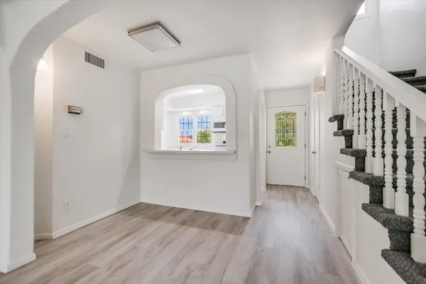 a view of livingroom with hardwood floor and a ceiling fan