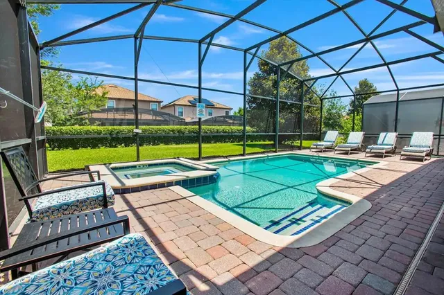 a view of a backyard with a patio