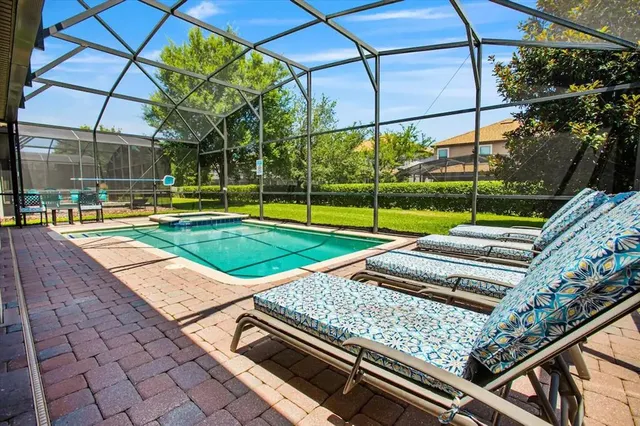a view of a chairs and table in the patio